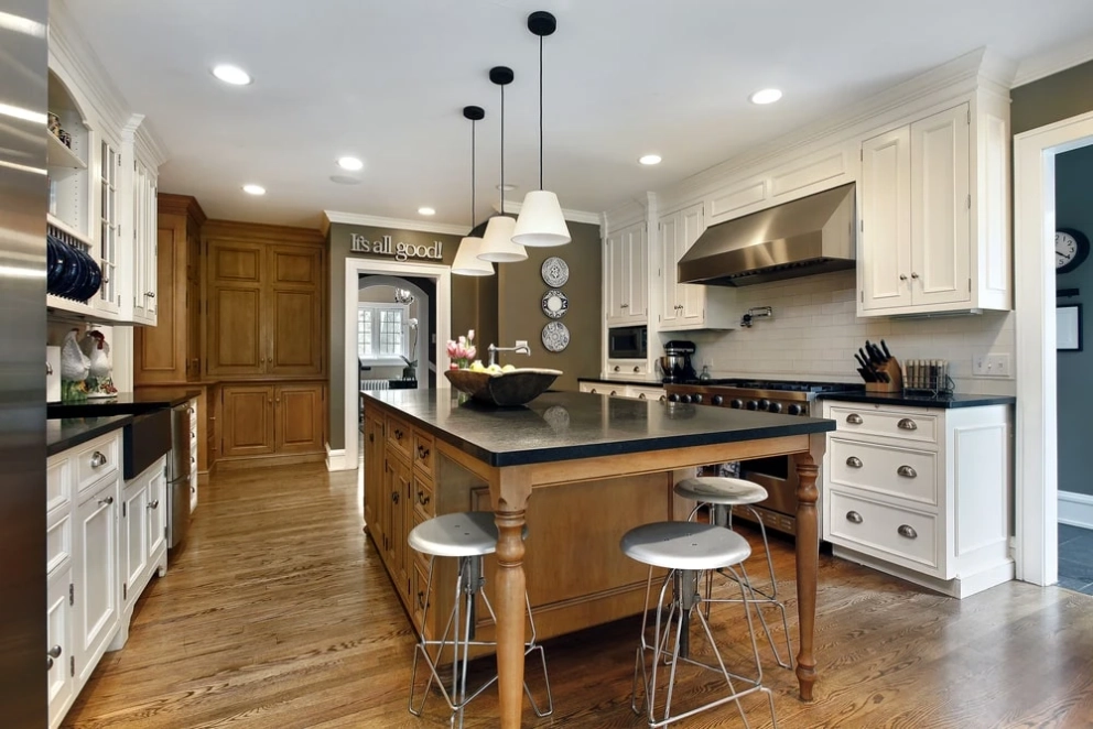 white kitchen cabinets with recessed panel doors in classic interior