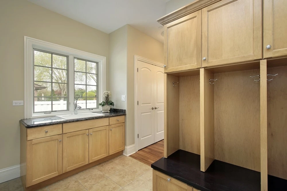 wide hall with unfinished hallway cabinets