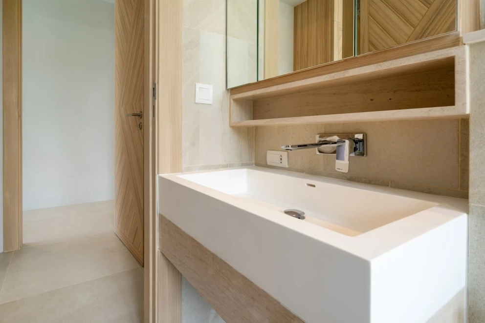 fitted sink and faucet in the bathroom