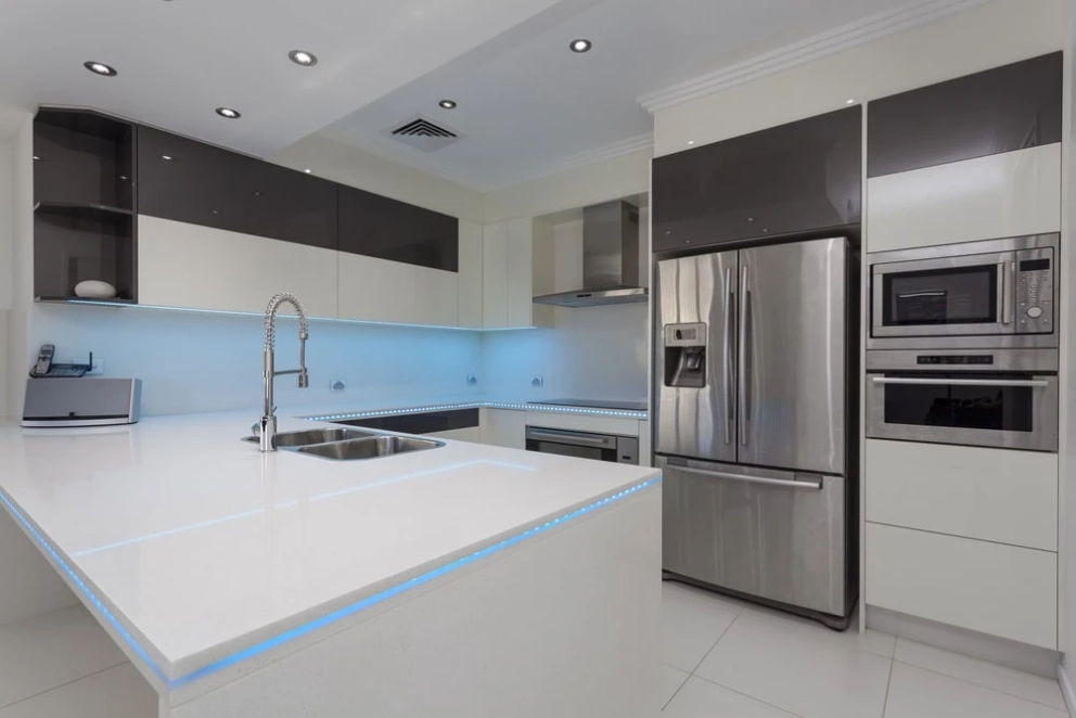 refrigerator integrated into two tone cabinets