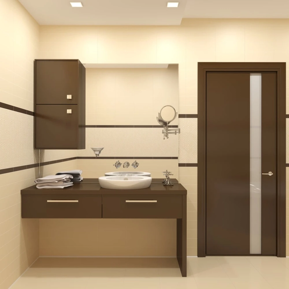well designed bathroom with matching sink and wall cabinets