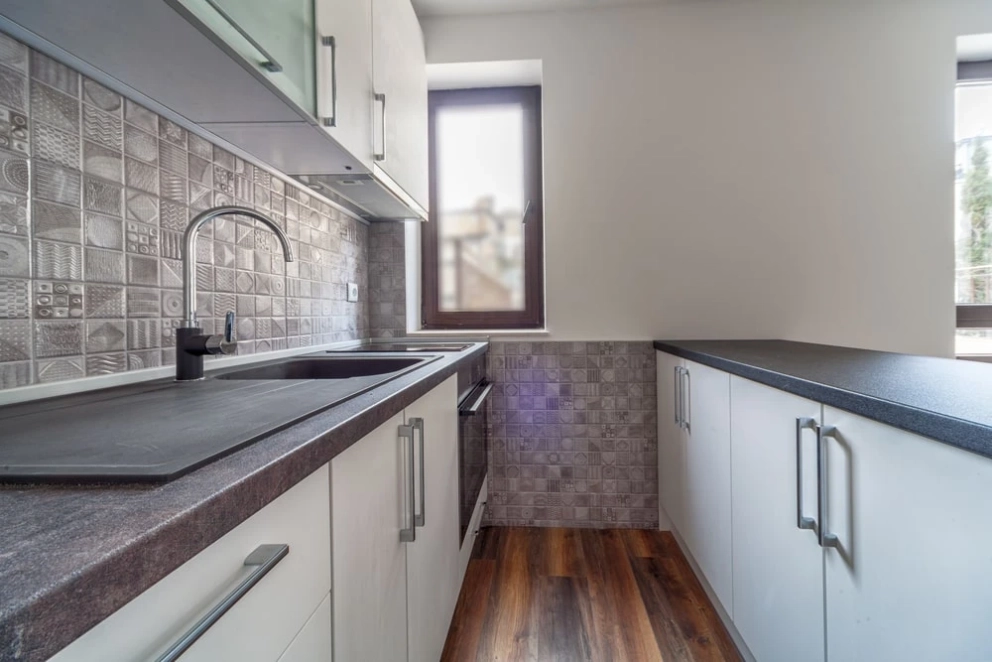 one-wall gallery kitchen minimum width with an island