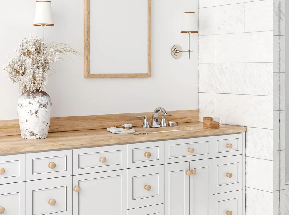 wooden knobs and vanity countertop in the bathroom