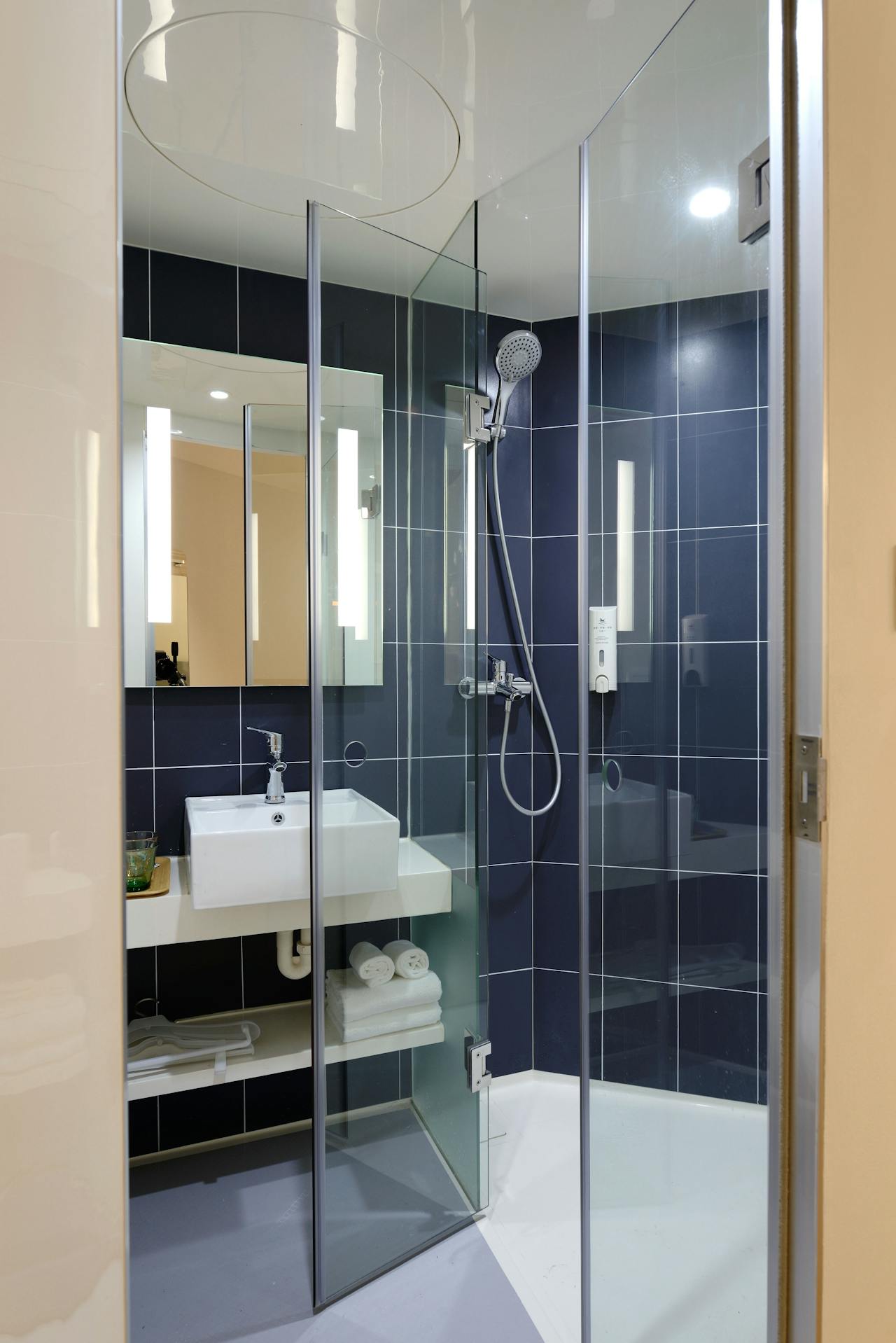 shower cabin ergonomics in small bathroom