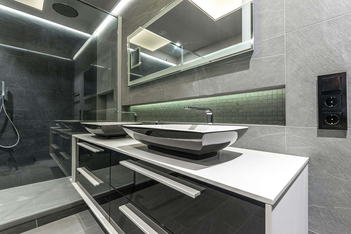 modern-looking bathroom with touchless sink faucets 