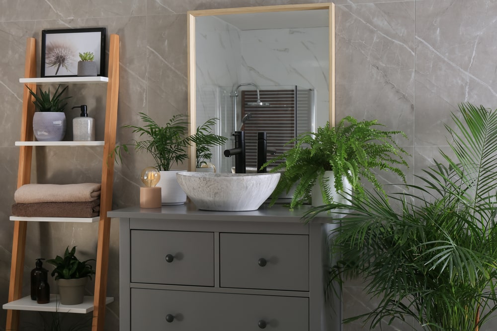 grey bathroom vanity with inset drawers single-sink