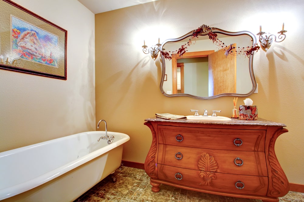 crafted wood vanity in the vintage-style bathroom