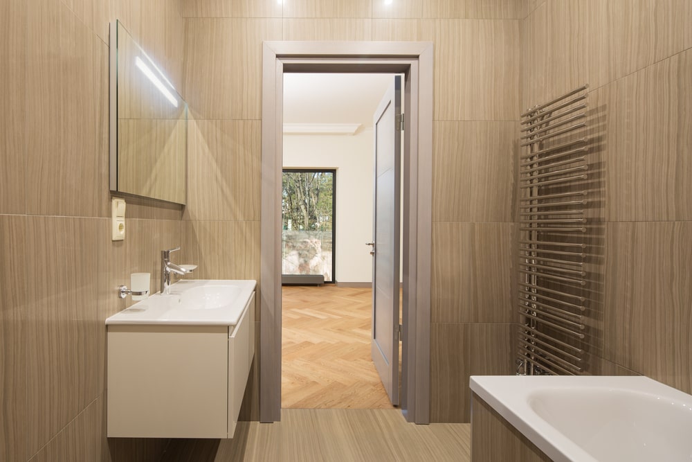minimal style bathroom with white floating vanity