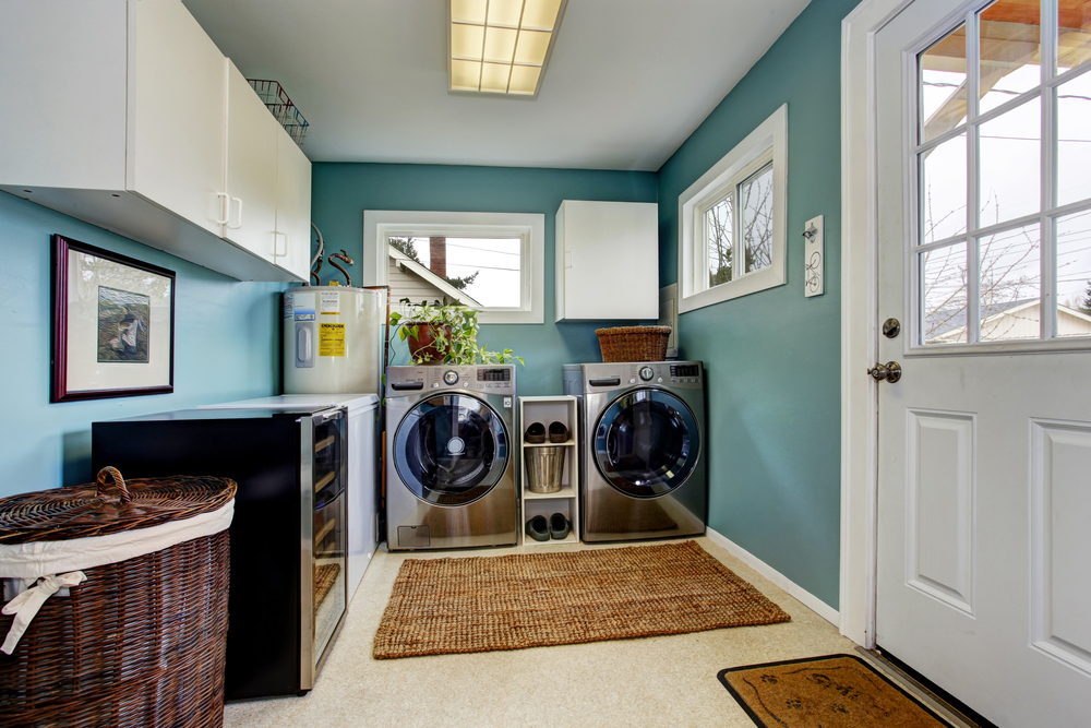 1. modern look laundry with cabinets