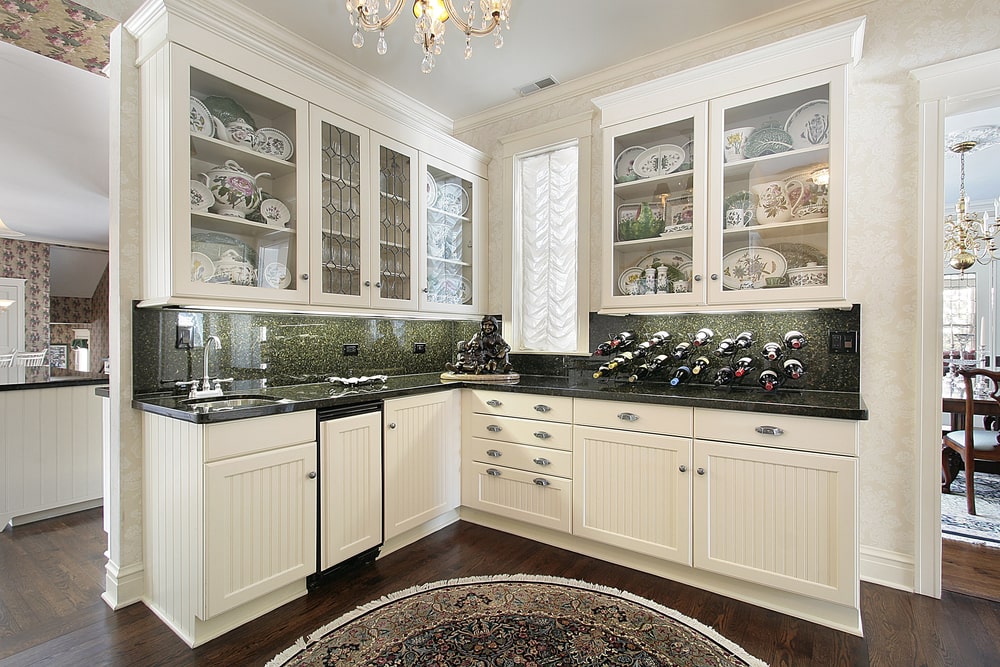 white kitchen upper cabinets with glass doors