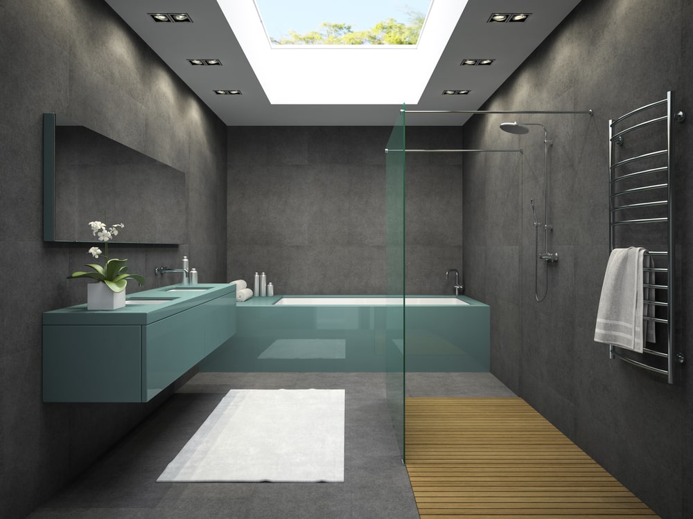 bathroom design with black tile and floor