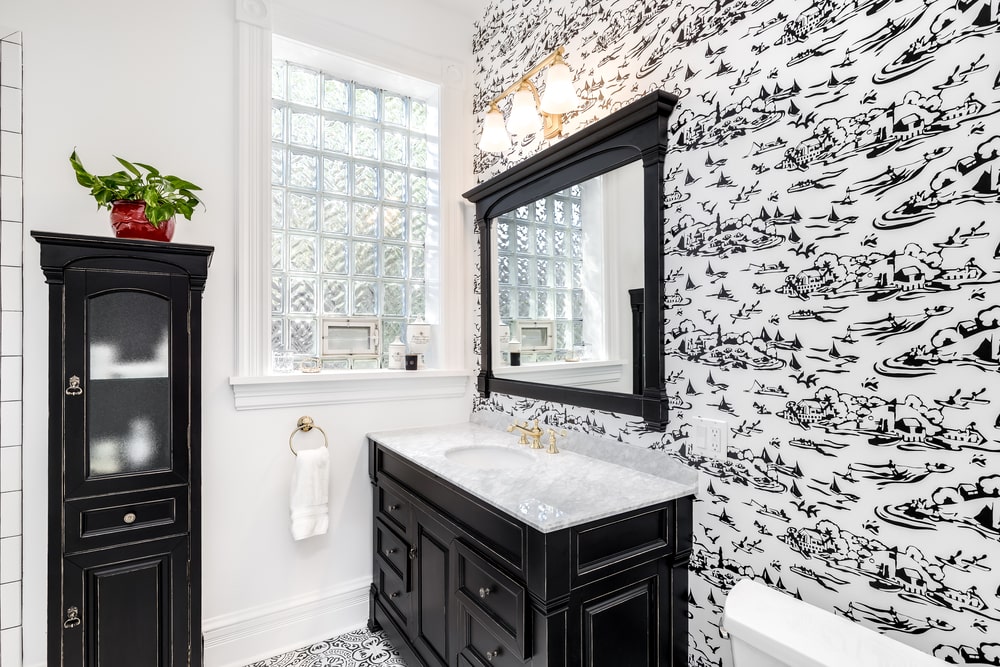 black and white bathroom aesthetic with wallpaper accent wall