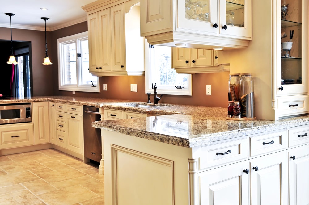 beaded kitchen cabinets and granite countertops with ogee edges