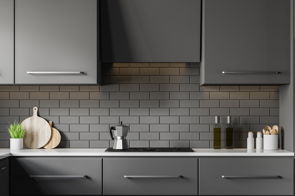 dark matte kitchen with the minimum gap between top and bottom cabinets