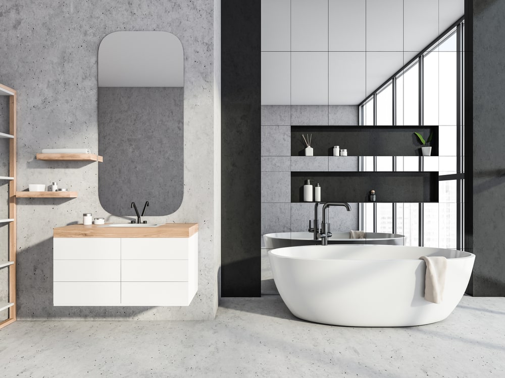 floating vanity with drawers and wood countertop in modern bathroom
