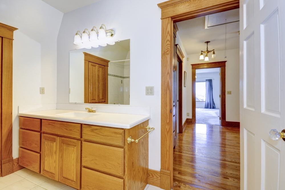 oak wood bathroom vanity with drawers and integrated sink top