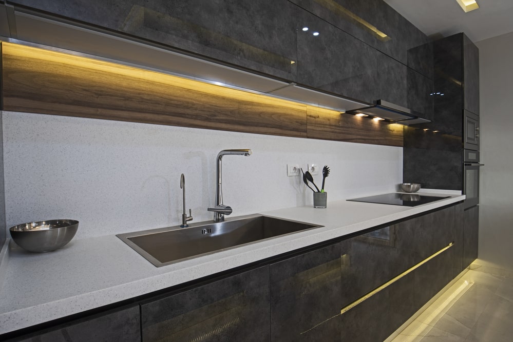 LED lighting illuminates distance between counter and upper cabinets