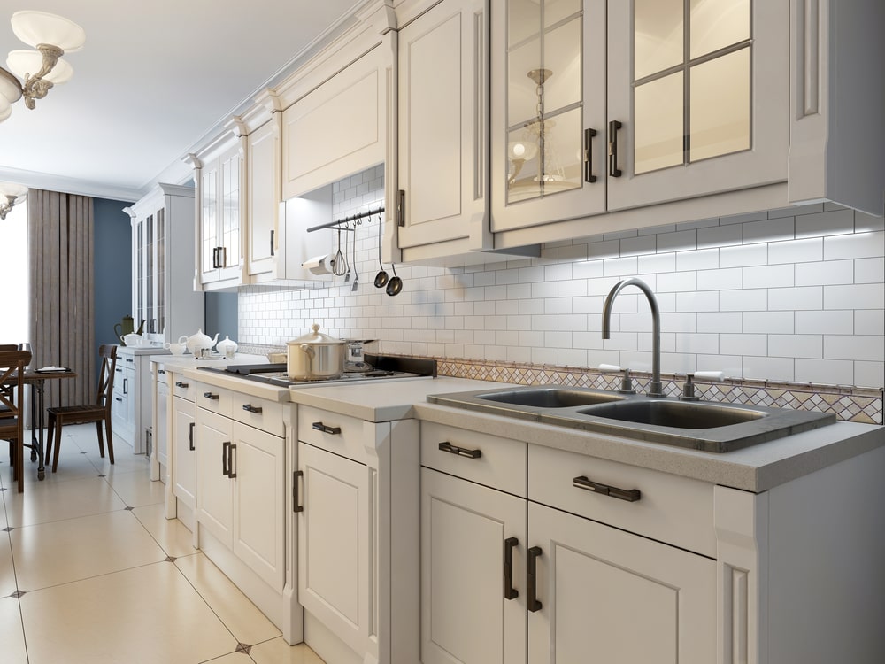 kitchen with white brick style backsplash