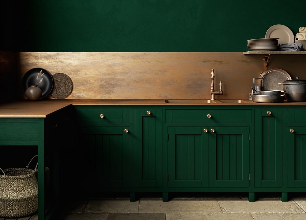 deep green kitchen with copper counter and backsplash