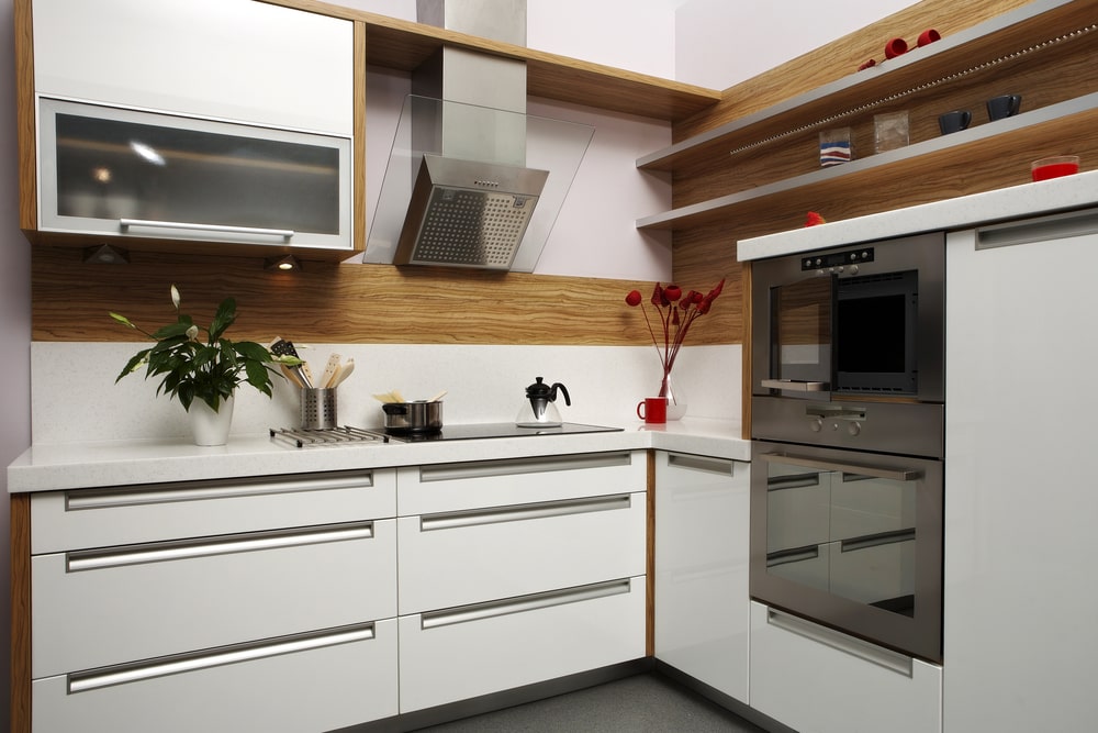 small L-shaped kitchen with aluminum recessed pulls