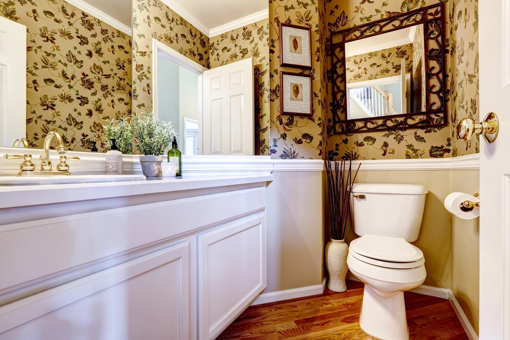 small classy bathroom with floral wallpaper-min