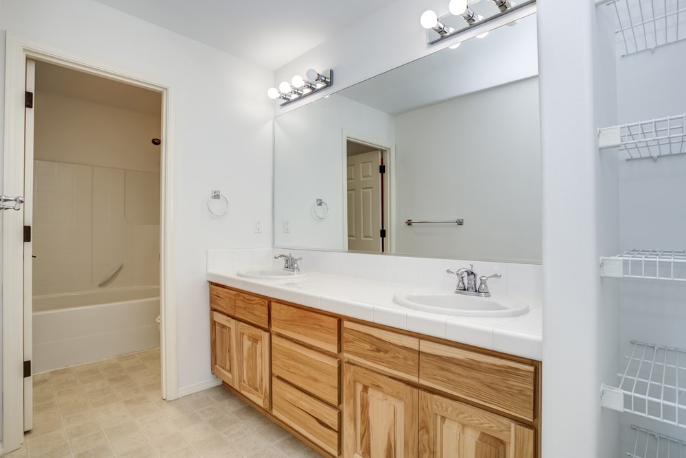 newly installed bathroom vanity custom from hickory wood