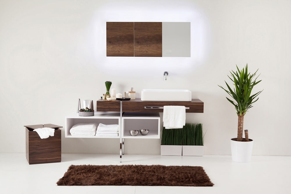 wood and white bathroom design with a matching cabinet set