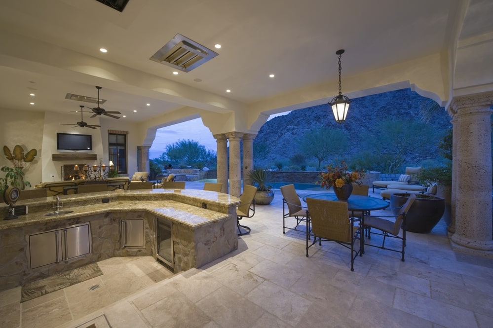 stone kitchen with a granite countertop outdoor