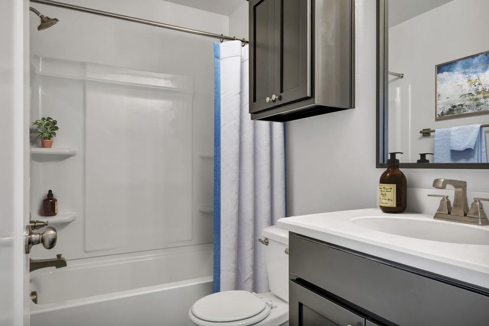 laminate bathroom cabinet resurfaced in the white interior