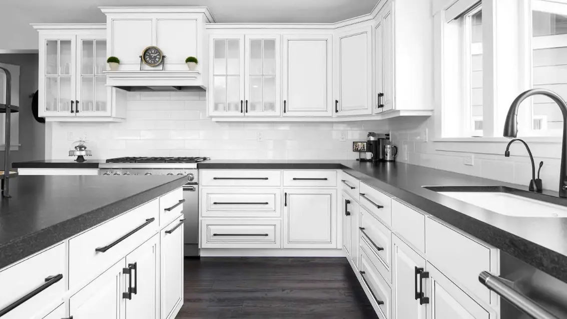 black quartz countertops white cabinets