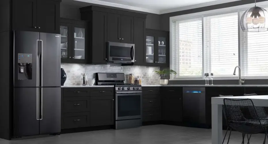 white kitchen cabinets with black appliances