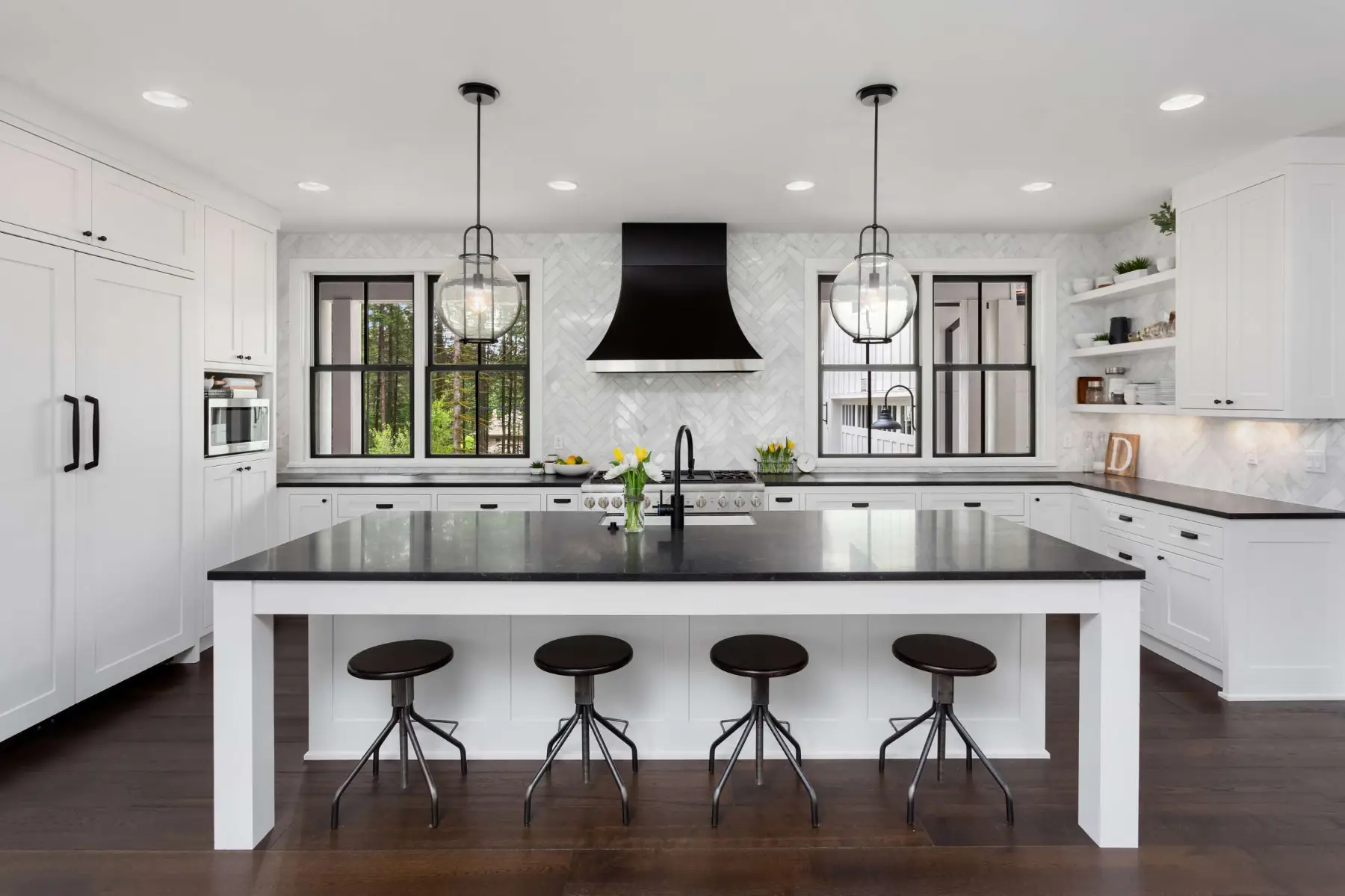 White kitchen cabinets with black countertops ▷ Walls and floor ...